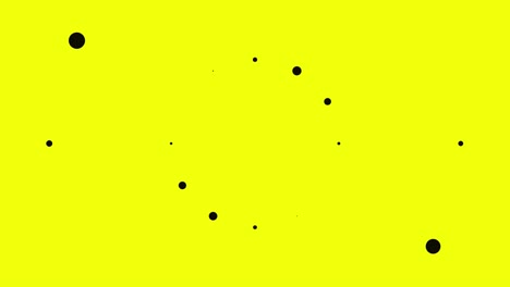 abstract pattern of black circles on yellow background