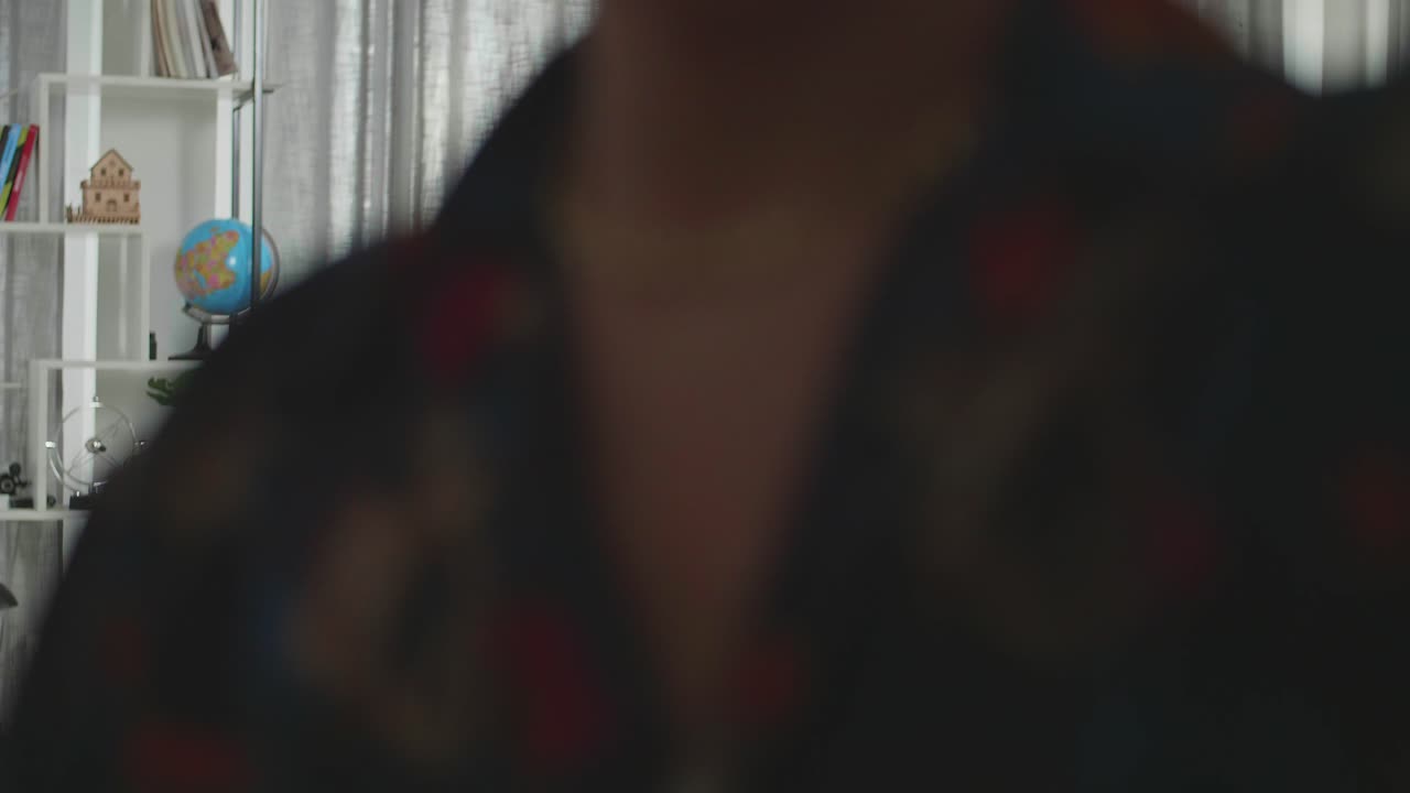 Stylish Man Posing in a Living Room