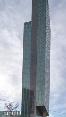 timelapse of skyscraper buildings in barcelona in vertical