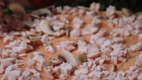 preparing a chicken mushroom pizza