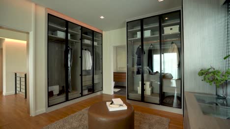 black and white modern built-in closet in master bedroom