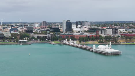 aerial orbital of cunningham pier and geelong cityscape, australia