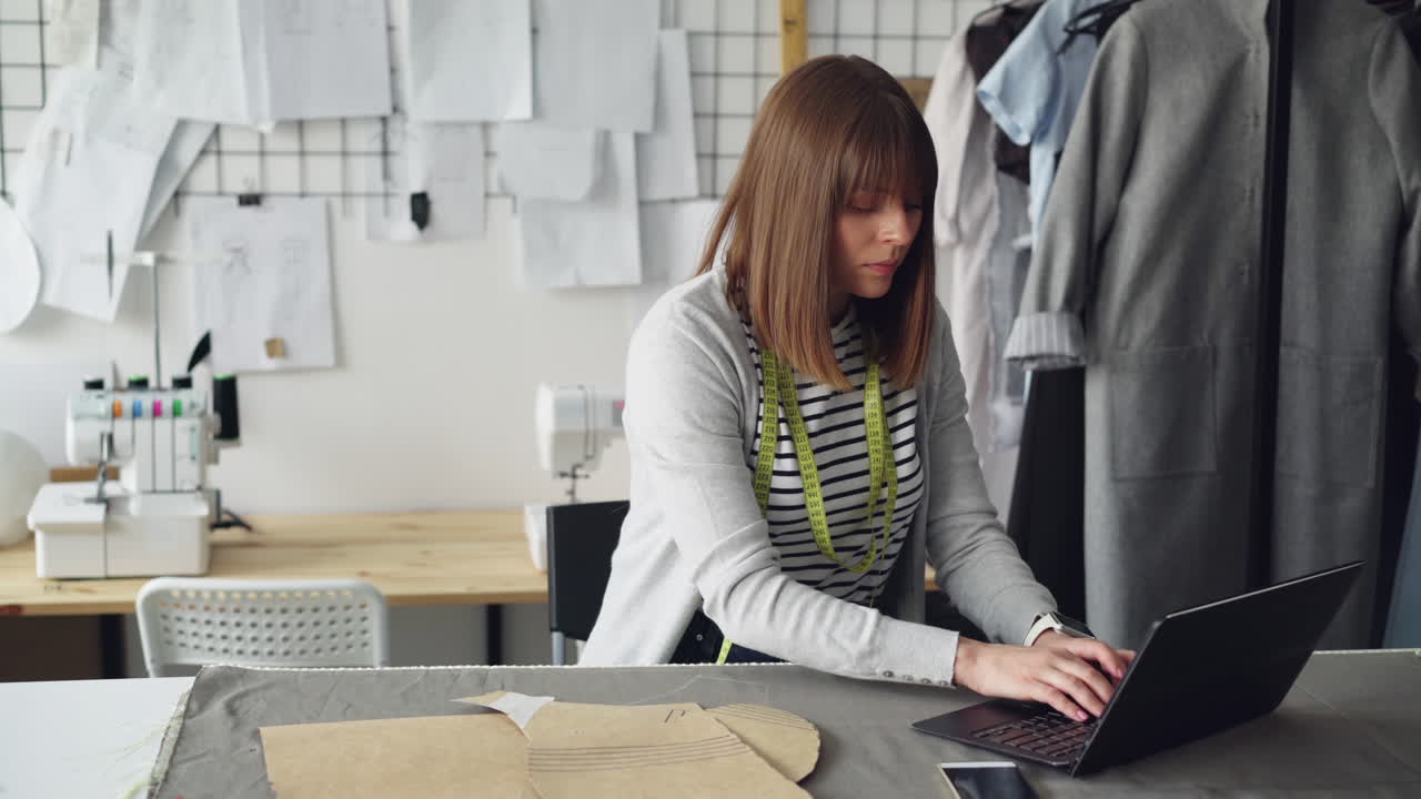 Fashion Designer Working in a Studio