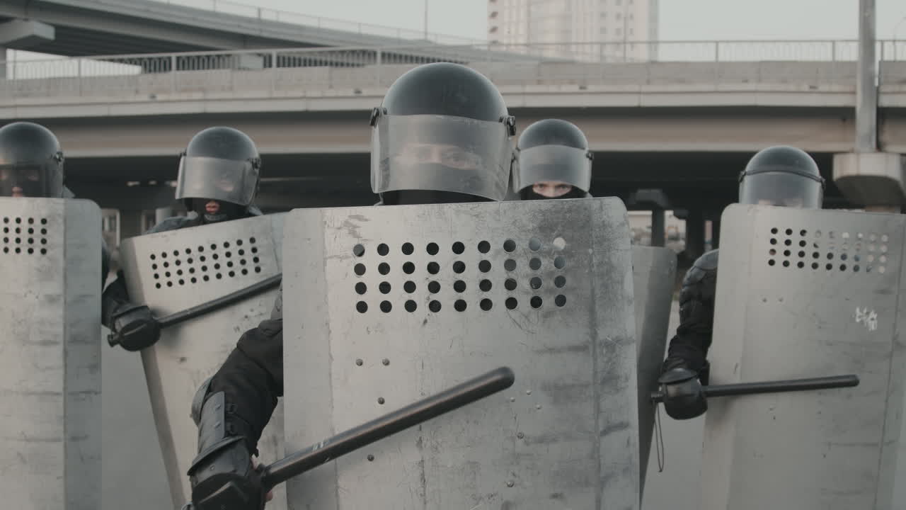 Riot Police with Shields and Batons
