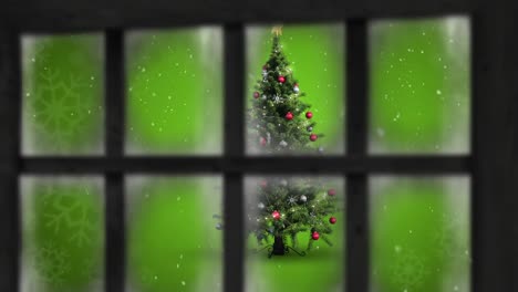 Animation-Von-Schnee,-Der-über-Den-Weihnachtsbaum-Fällt,-Und-Winterlandschaft,-Die-Durch-Das-Fenster-Gesehen-Wird
