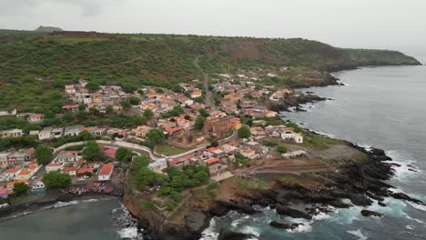 Aerial-View-Of-Rocky-Coast-And-Waterfront-Town-In-Cape-Verde,-West-Africa