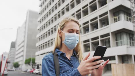 low angle view of caucasian woman wearing a coronavirus covid19 mask