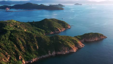 cheung chau colourful lush island foliage coastline aerial ocean view hong kong slow right flyover