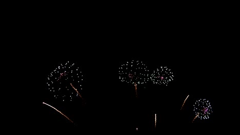4k. seamless loop of real colorful fireworks festival in the sky display at night during national holiday, new year party or celebration event