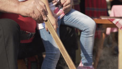 close up man makes plum jam ,traditional cooking