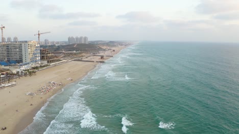 Drone-shot-of-the-shore-near-a-construction-site