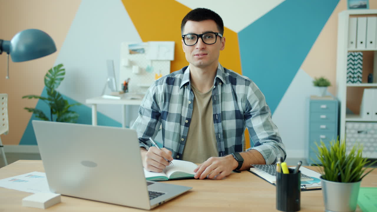 Man Working at his Desk in Modern Office