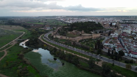 aerial view of alcazaba of badajoz at dusk in badajos, extremadura, spain.