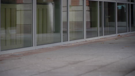 college students walking outside campus buildings, anonymous