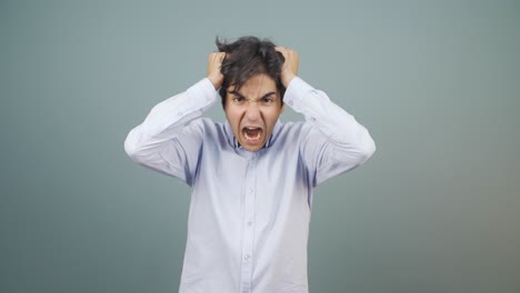 man having a nervous breakdown in front of the camera.