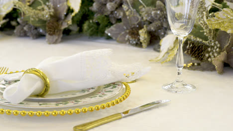 Table-decorated-for-holidays-with-dinnerware-close-up