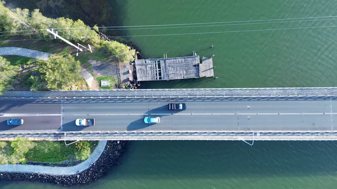 Drone aerial landscape cars driving on Toukley bridge travel transport infrastructure Gorokan boat ramp wharf Central Coast Australia