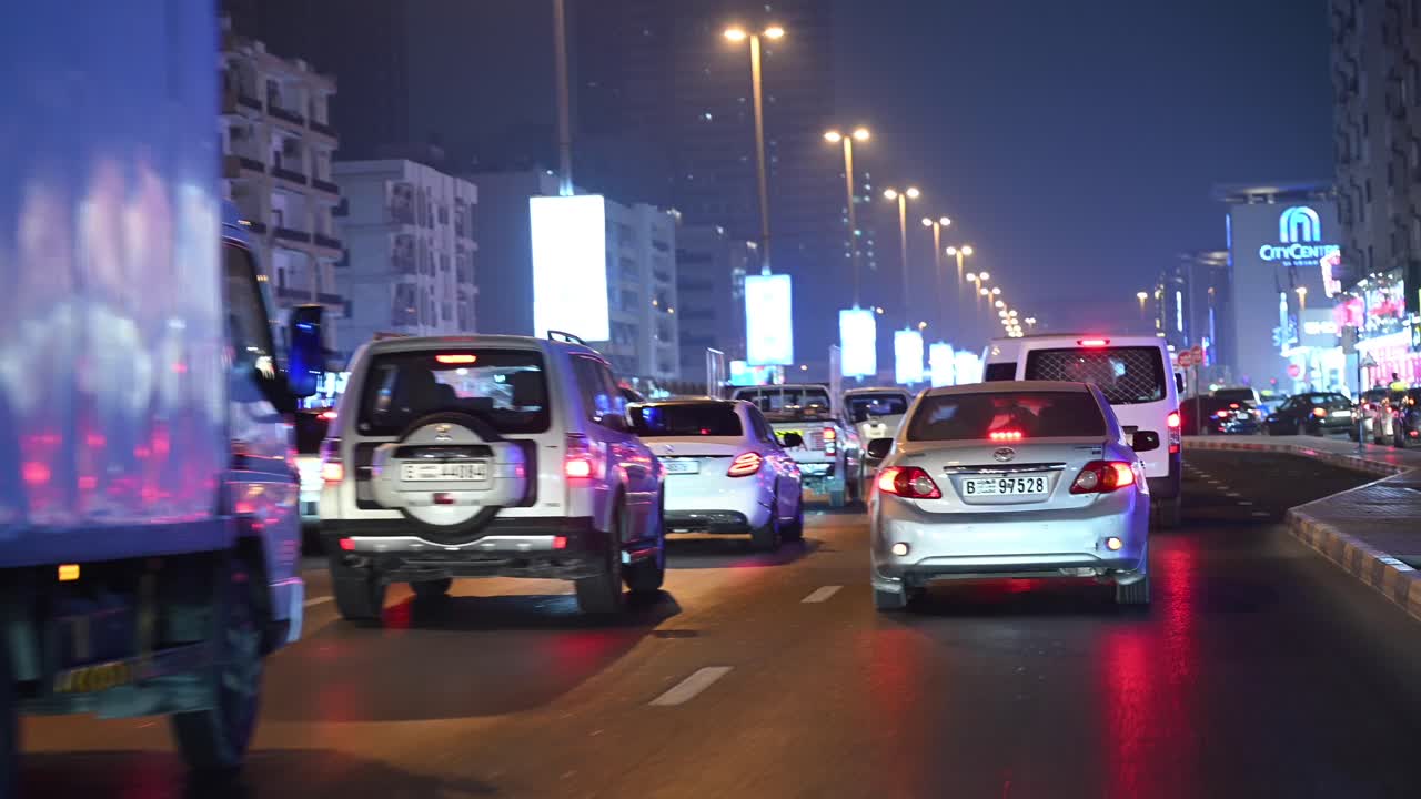 Evening rush hour brings slow-moving traffic to the streets of Sharjah, UAE
