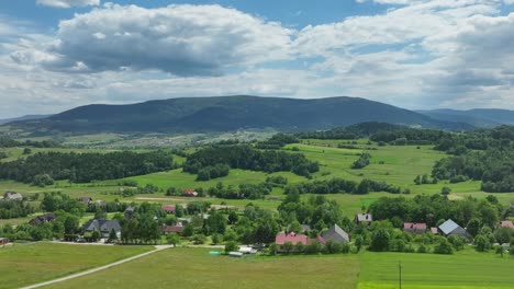 mountainside scenery with holy cross, spiritual symbol on mountain trail