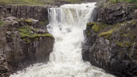 powerful nykurhylsfoss  waterfall in iceland in floods