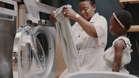 laundry, mother and child helping with folding