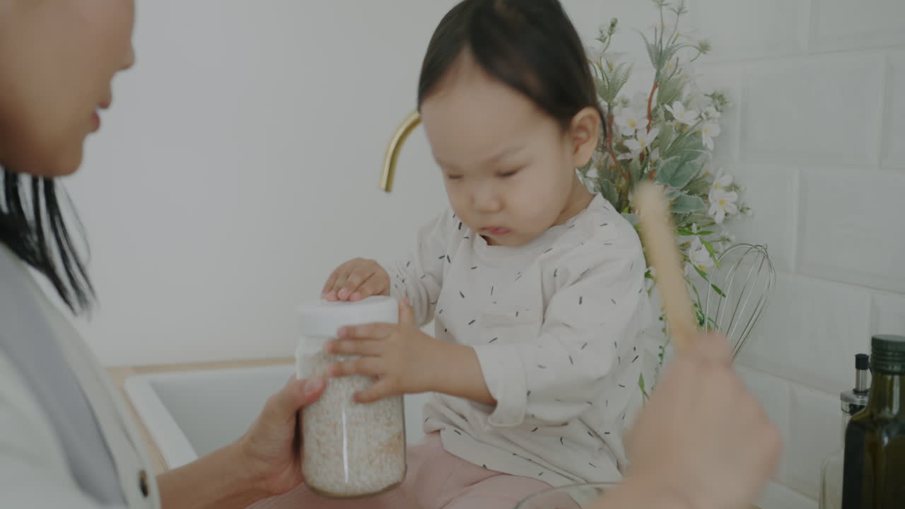 Mother and Toddler Cooking Together