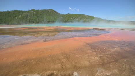 steam above grand prismatic pool, hot spring in yellowstone national park, wyoming usa