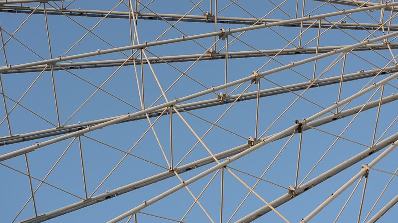 Big wheel against the sky. Shooting in the evening