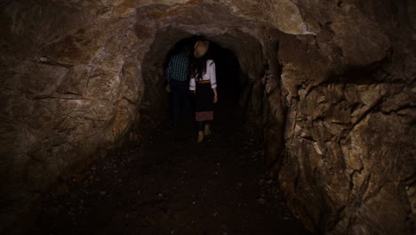 romanian people walking in the cave