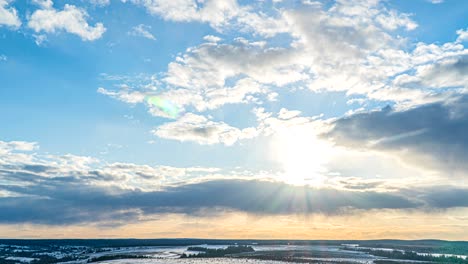 simultaneous movement of clouds of different levels, time intervals, beautiful pre-sunset landscape loop video