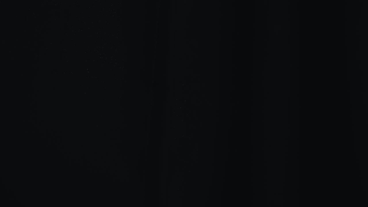 Hands Opening Dark Curtain Into Sunlight, Caucasian Fingers With Painted Nails Slowly Pull Back Heavy Black Drape To Reveal Sheer White Curtain And Bright Morning Sky Soft Glow Through Fabric Creates