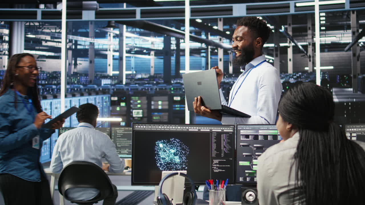Happy data center admin using node tree tool doing high five with coworker