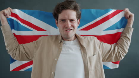 man holding british flag