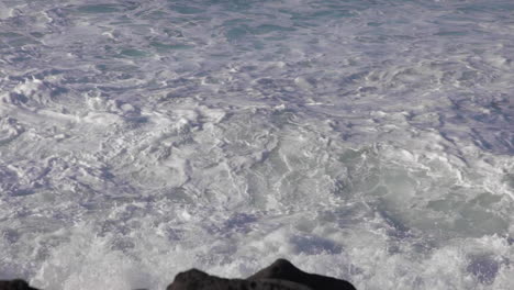 reckless wild waves hitting shores of azores island portugal