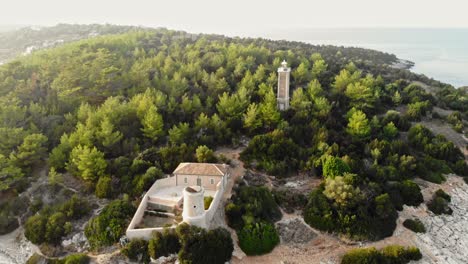 ruins of old venetian lighthouse near the new lighthouse in fiscardo village, kefalonia island, greece