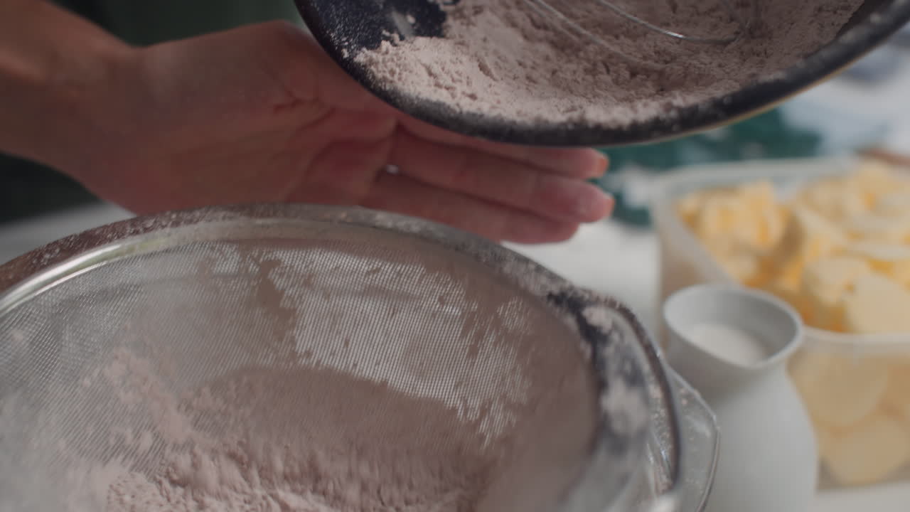 Unrecognizable People Making Dough for Baking