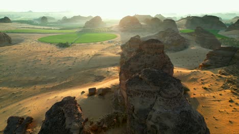 cinematic drone shot orange sunset over endless desert landscape