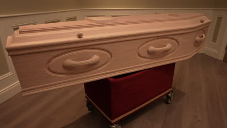 Beautiful-wooden-coffin-exhibited-indoors