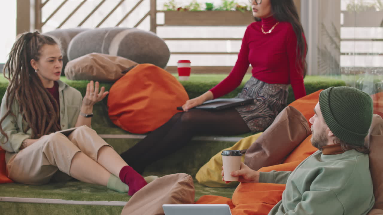 Young Start-Up Employees Discussing Project