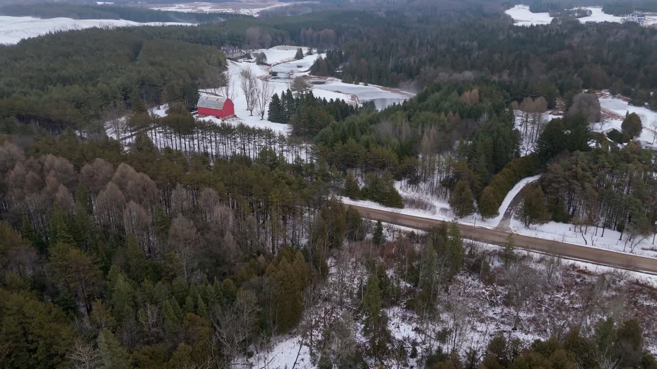 Establishing drone shot of Alton Grange and luxury estate Private Trout Club in Alton, Ontario, Canada