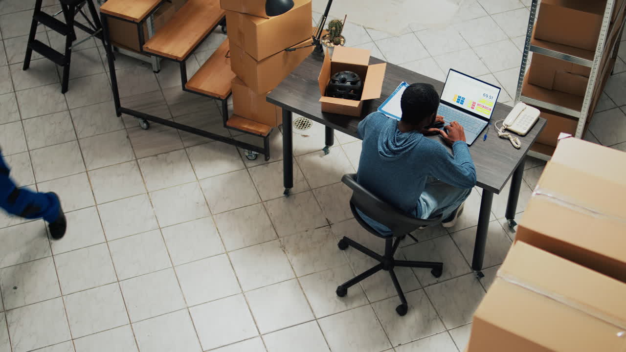 Man working in storage office
