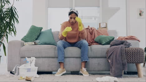 housework, exhausted and woman cleaner on a sofa
