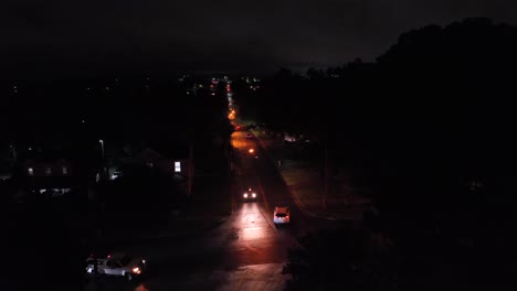 nighttime aerial view of a residential street