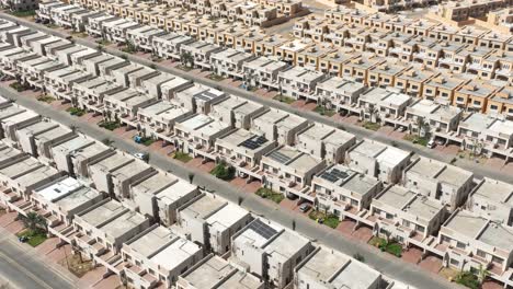 aerial drone view of rows of modern houses bahria town housing estate in karachi