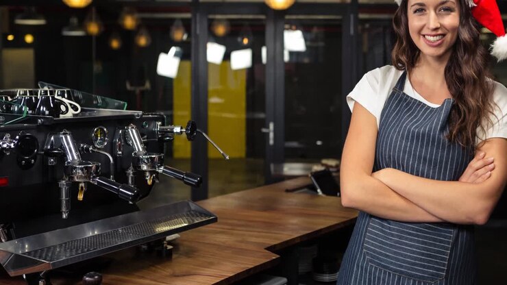Animation of african american boy in santa hat holding snow globe at christmas time