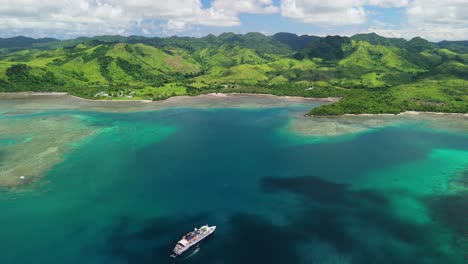 drone flying over cruise ship in fiji around remote islands