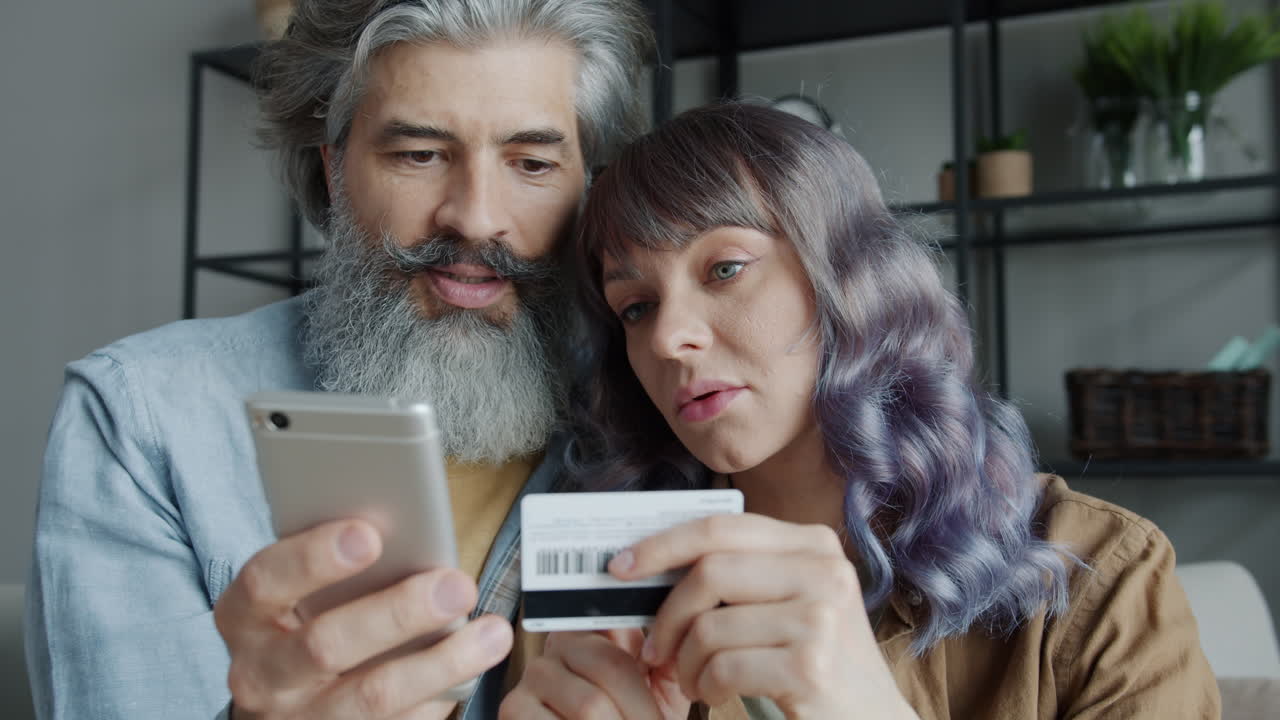 Couple shopping online with credit card