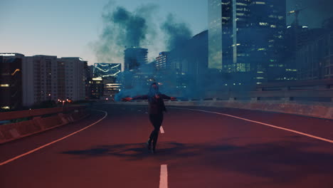 woman-dancing-with-smoke-grenade-in-city-at-sunset-rebellious-girl-enjoying-dance-in-street