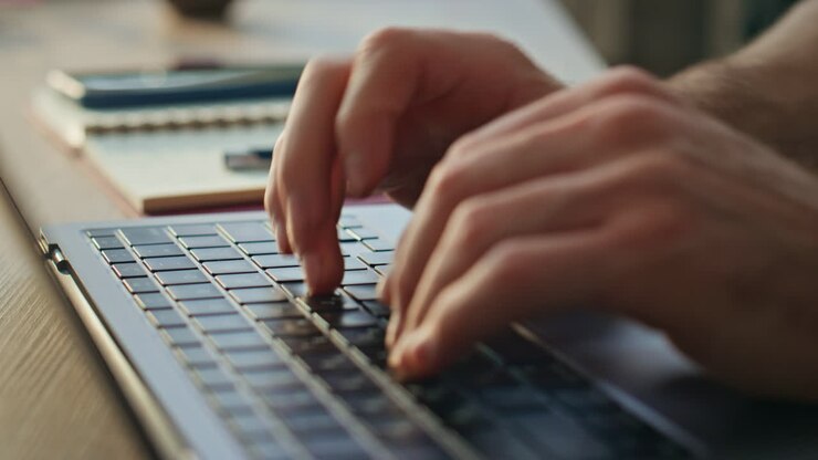 Copywriter hands writing copybook working at home close up. Businessman hands