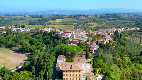 nice aerial top view flight tuscany medieval village mediterranean wine growing region panorama orbit drone